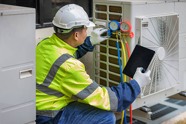 Professional Hvac Installation technician working in Trumbauersville, PA
